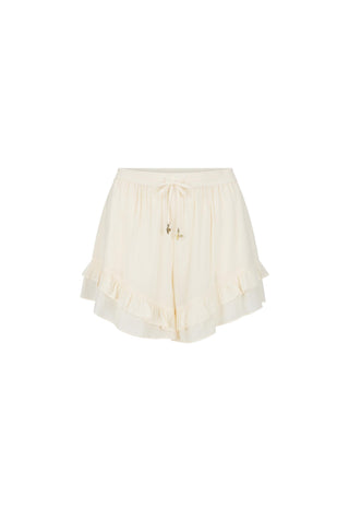 cream-ruffled-shorts-with-a-drawstring-waist-and-small-gold-decorative-accents-shown-against-a-plain-white-background