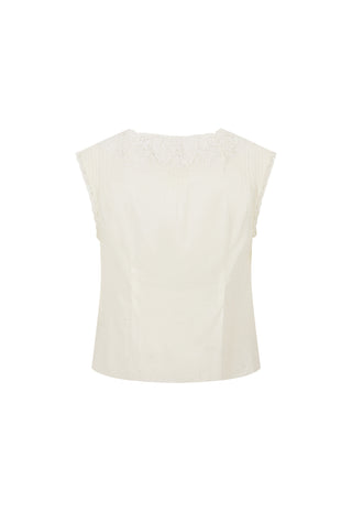 an-off-white-sleeveless-top-with-a-delicate-lace-or-embroidered-yoke-at-the-neckline-shown-against-a-plain-white-background