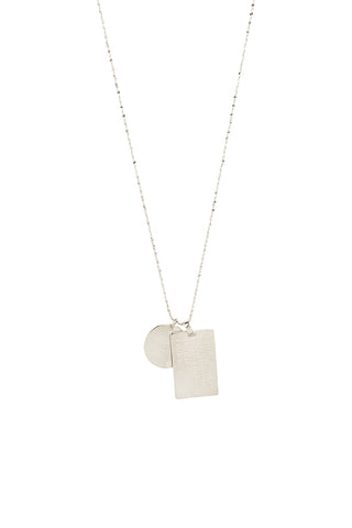 Back view of Spell’s Virgo Stargazer Zodiac Necklace. The double embossed pendant charm necklace comes in 0.925 Sterling Silver and hangs from a twisted rope chain.